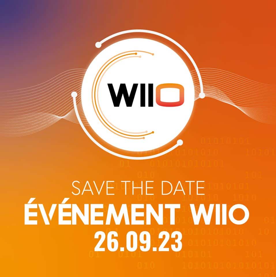 L'image représente un save the date à l'événement WIIO 2023. Le fond et un dégrader d'orange, rouge et violet. Au centre, le logo de WIIO est représenté.