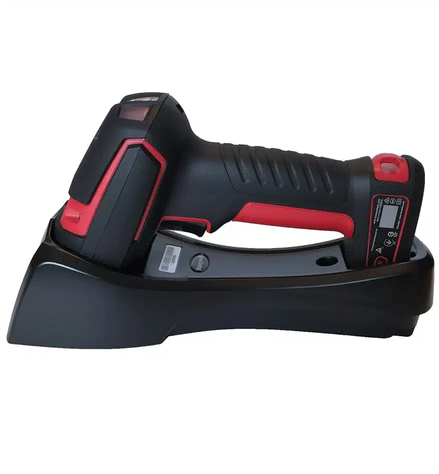 Scanner durci Honeywell Granit sur sa base de chargement.