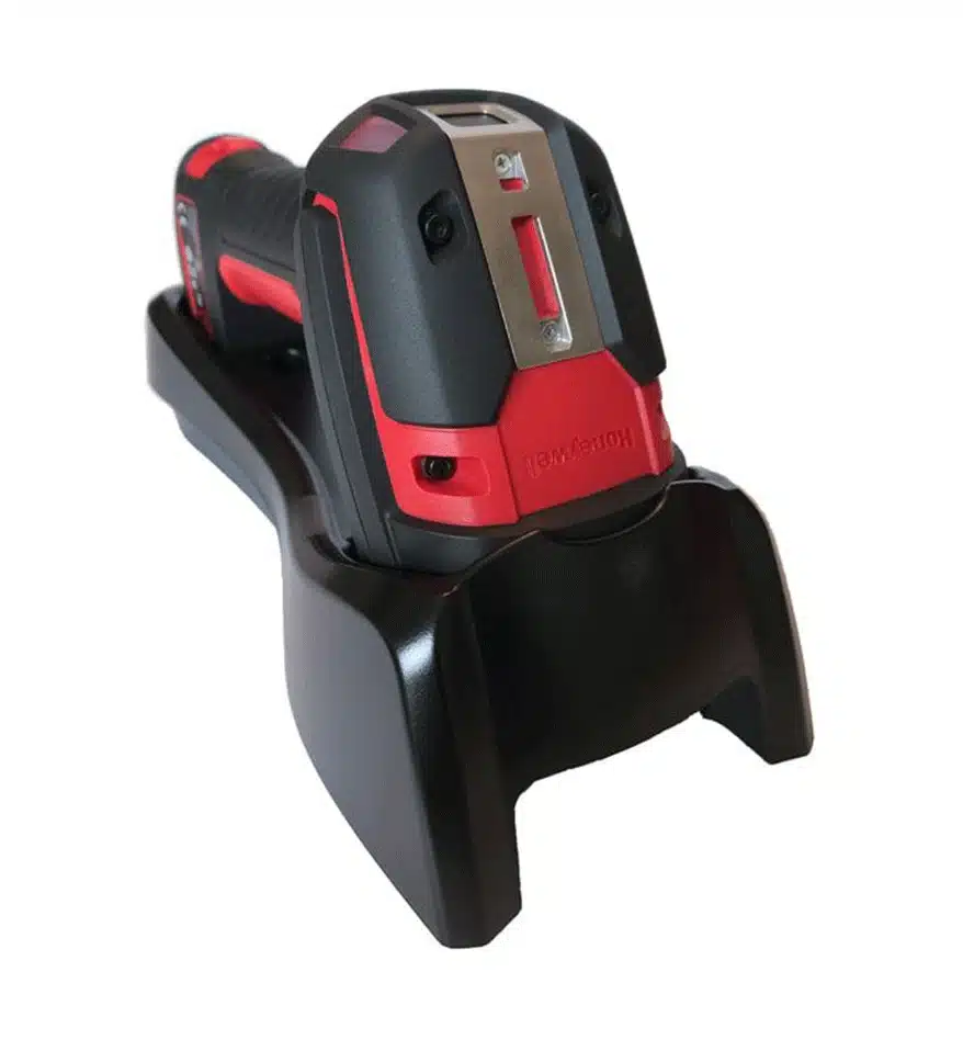 Scanner durci Honeywell Granit XP 1991i SR sur sa base de chargement.