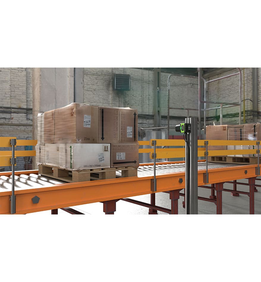 Palette de cartons sur convoyeur avec le scanner fixe Zebra FS70.