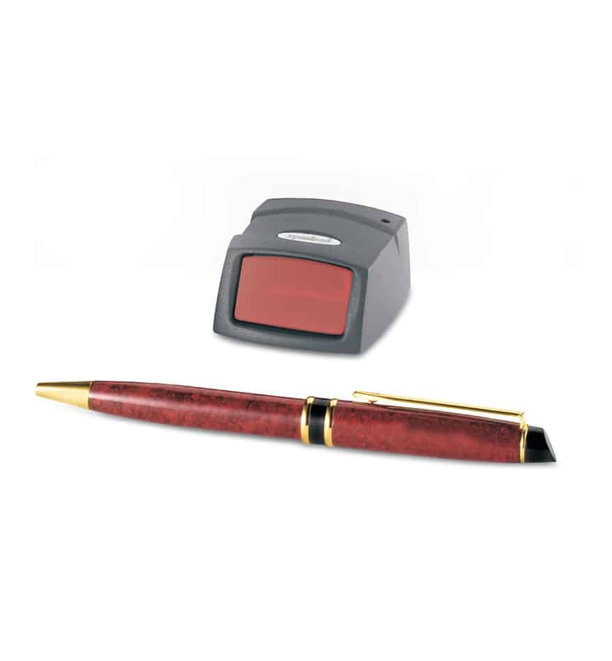 Scanner Zebra MiniScan MS954 fixe et un stylo élégant sur fond blanc.