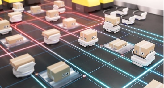 Solutions de préparation de commande : Robots autonomes transportant des colis dans un entrepôt.