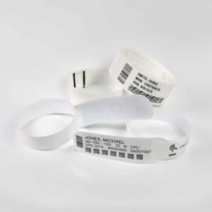 Bracelets d'identification thermique et laser avec informations patient : Jones, Michael et Smith, Chris.