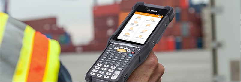 Terminal portable affichant des solutions de gestion d'entrepôt avec un clavier physique.