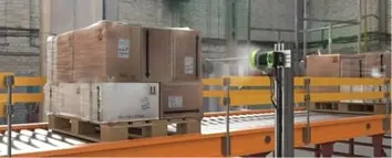 Palette de boîtes dans un entrepôt, modernisation des écrans (Velocity).