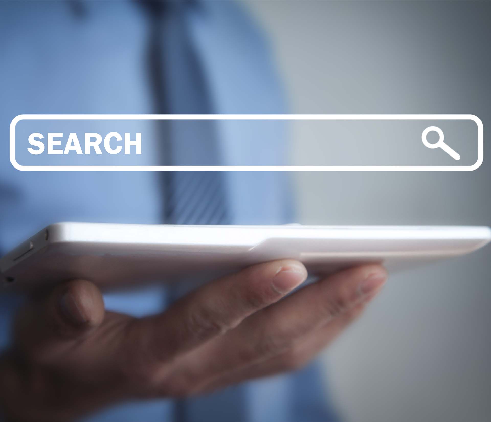 Recherche sur tablette. Barre de recherche avec le mot "SEARCH" et une loupe.